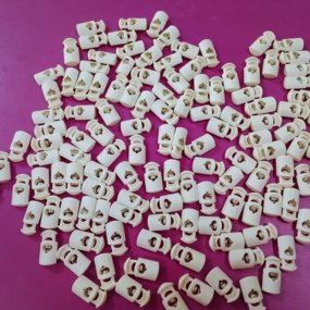 IMPORTED- CORD STOPPER-SINGLE HOLE-WHITE